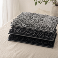 Pack Trio : trois tapis Pattelin gris moyen, gris anthracite et noir empilés